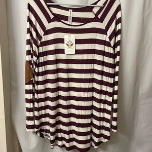 Woman’s long sleeve top, patches on the elbows